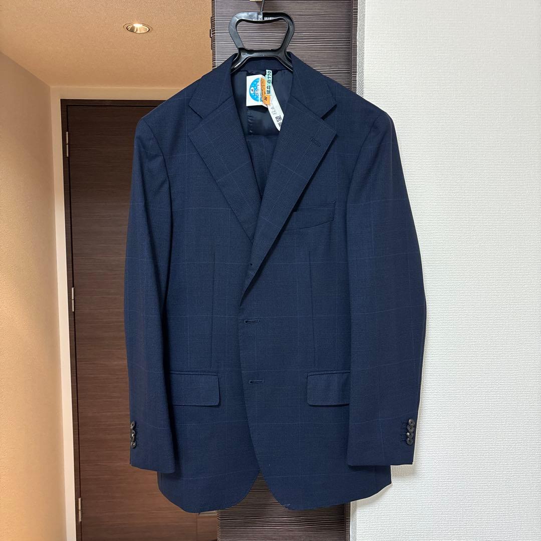 ユニバーサルランゲージ スーツ ネイビー チェック柄 - メルカリ