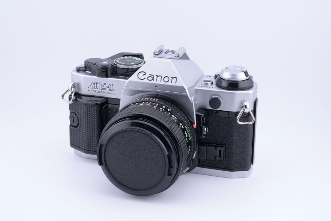 フィルムカメラ Canon AE-1P + NewFD 28mm F2.8 Canon AE-1 w/ FD 28mm f/2.8 lens recent CLA – Film Supply Club