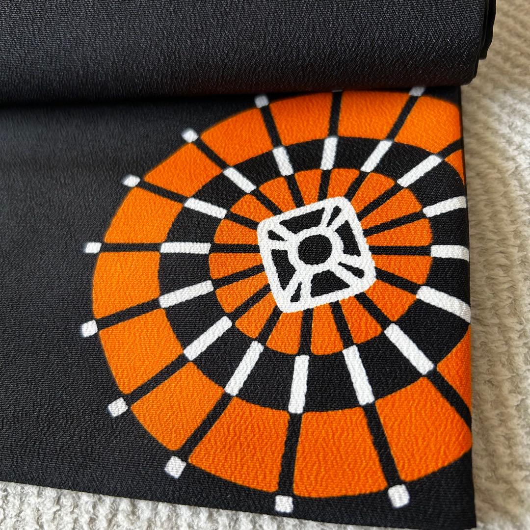 幾何学模様 洒落 袋帯 黒地 オレンジ 白 約400cm 個性的 未使用 - メルカリ
