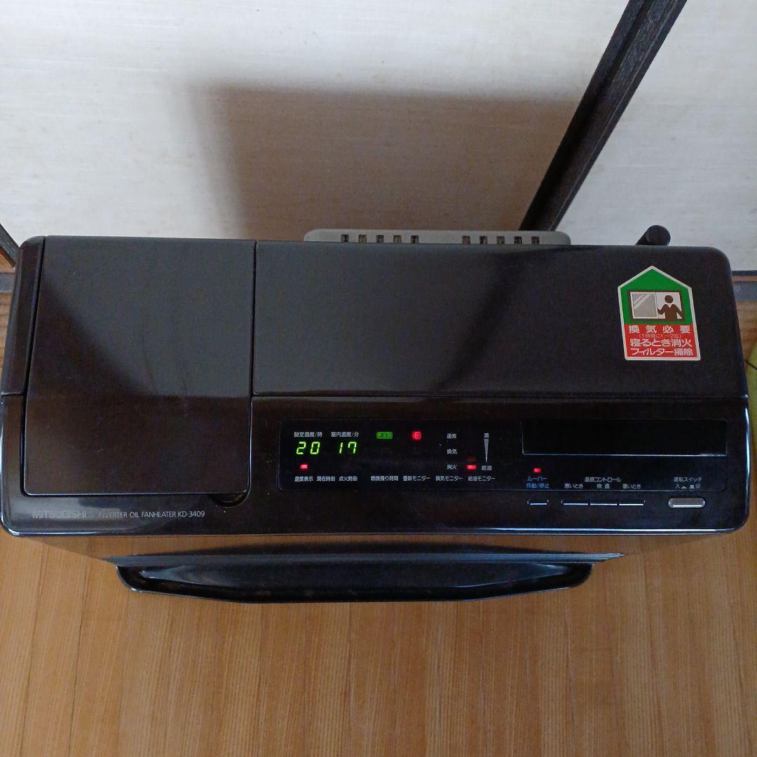 三菱 石油ファンヒーターKD-3409,木目調 - メルカリ