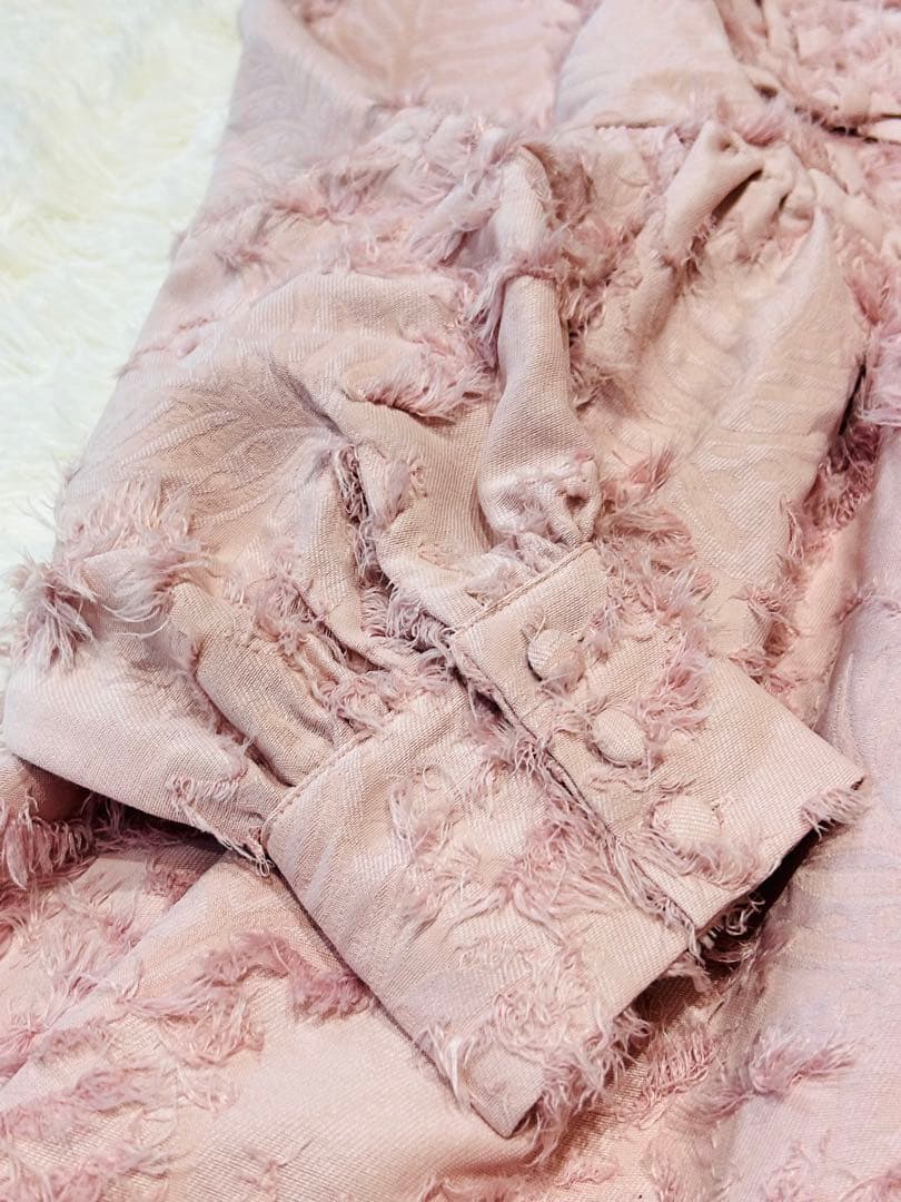 新品タグ付】merry jenny リボンフリンジジャガードチュニック ピンク