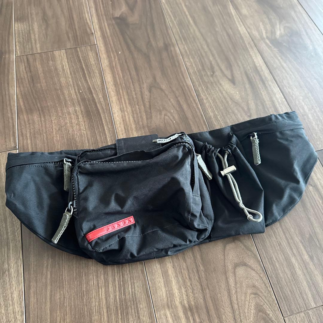 プラダ　PRADA ブラックウエストポーチ ポケット付き　本物 PRADA ウエストポーチ (PRADA/バッグ・カバンその他) 117343046【BUYMA】