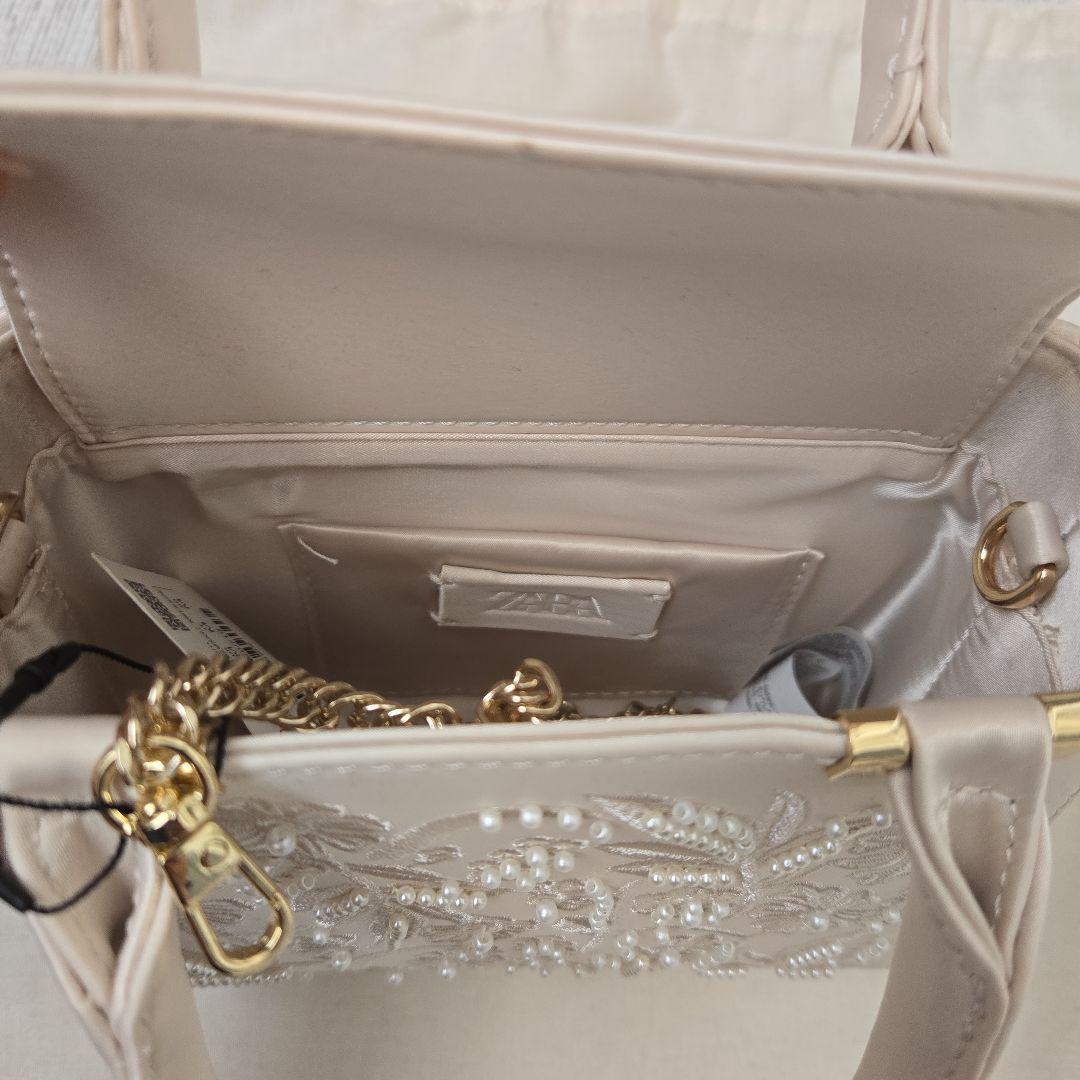 新品•未使用品！zara サテン風フェイクパールバッグ - メルカリ