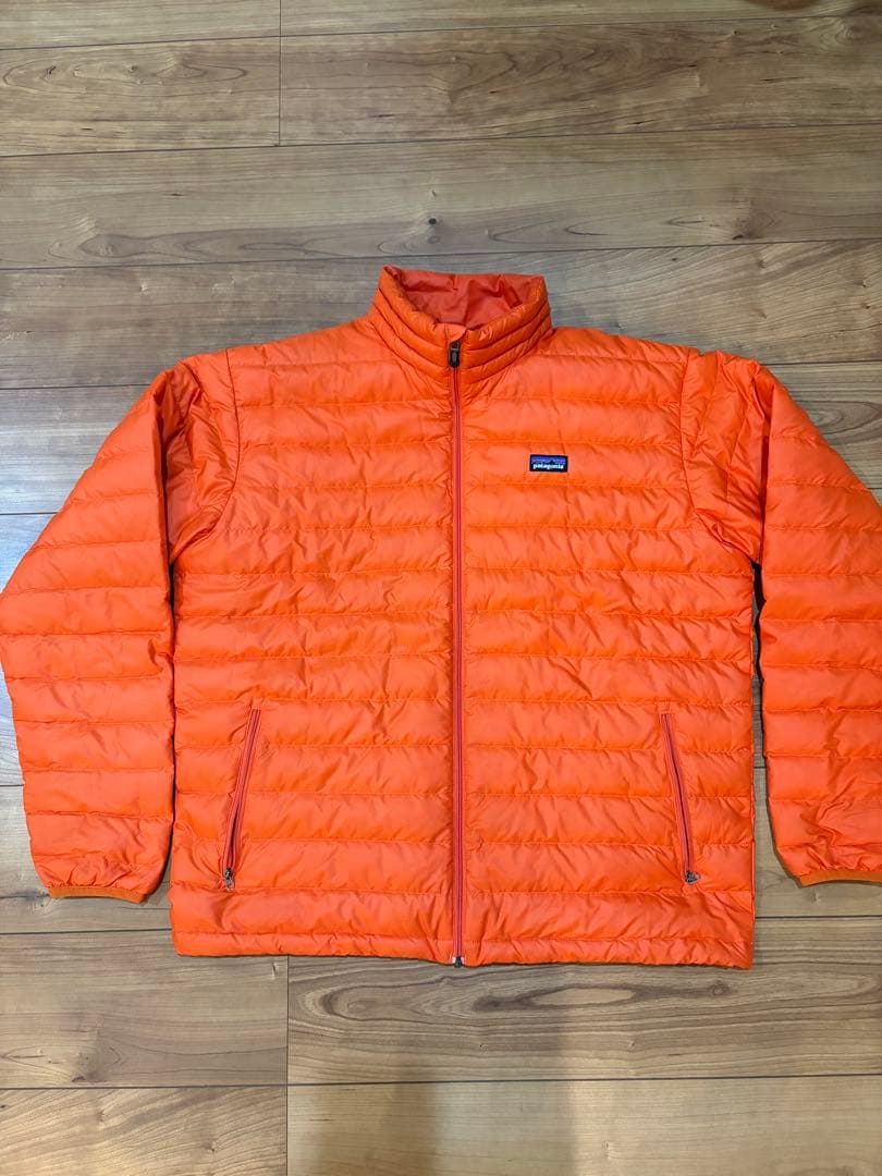 【廃盤色】patagonia ダウンセーター　オレンジ　ドローコード付 廃盤色】patagonia ダウンセーター オレンジ ドローコード付 中古