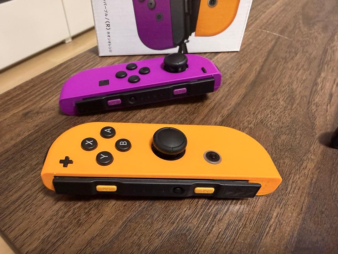 Nintendo Switch ジョイコンパープルイエローストラップ付き - メルカリ