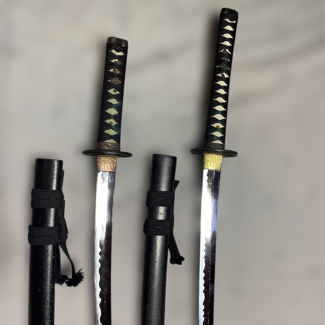 割安模造刀大小2本 黒柄 雲龍楕円鍔 黒梨地鞘 - メルカリ