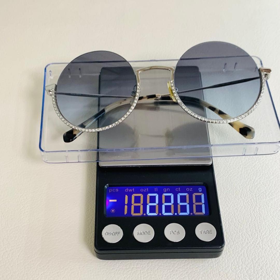 ミュウミュウ サングラス SMU69U べっ甲 柄 ラウンド ラインストーン