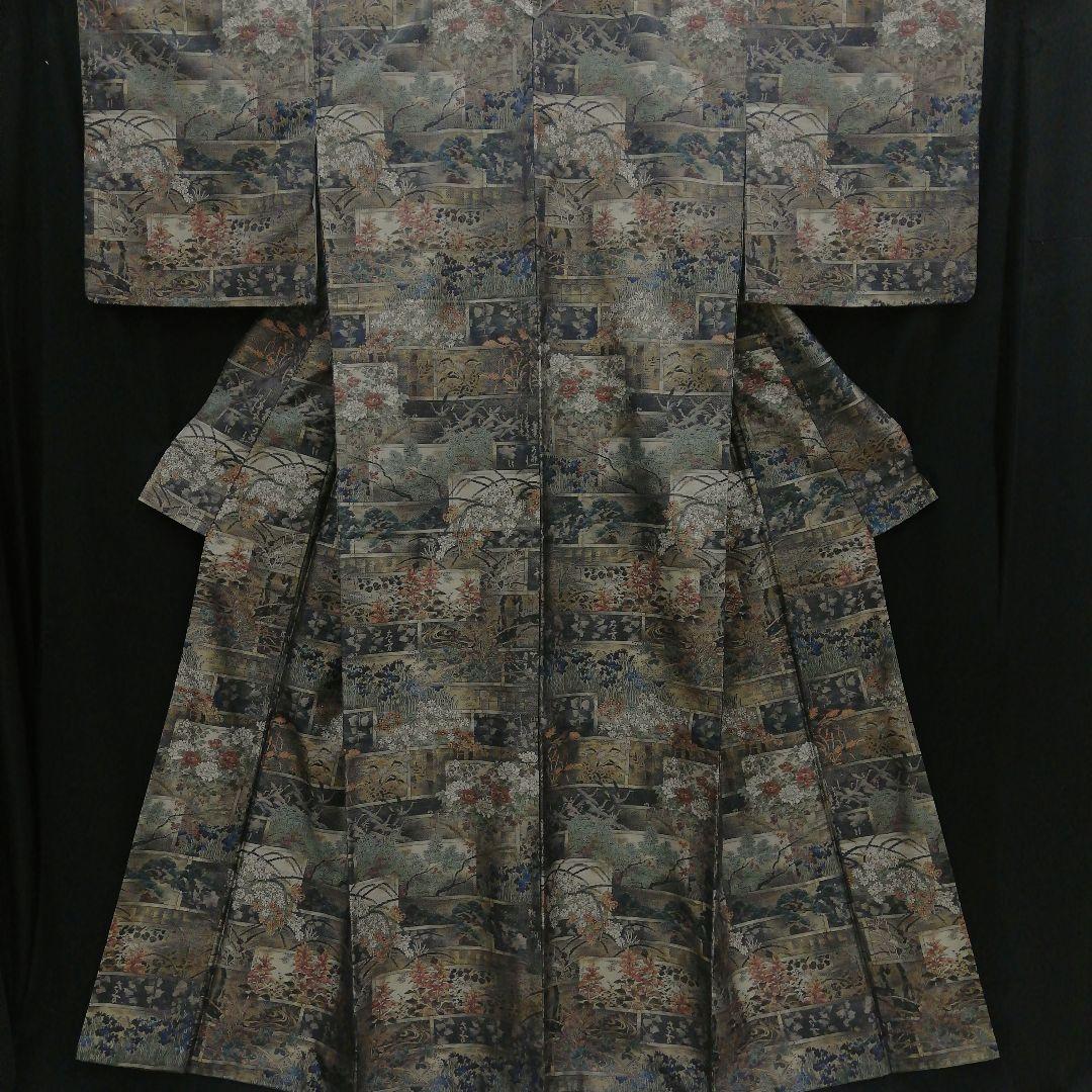 本場大島紬(袷) (四季の草花紋様 恵 積五郎(絣の魔術師) 裄68㌢身幅