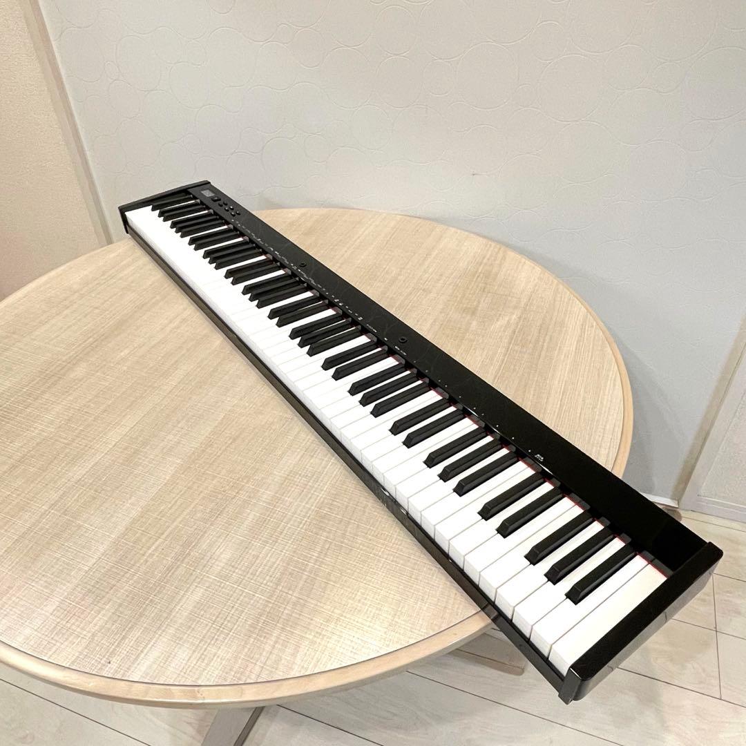 電子ピアノ】88鍵盤 ペダル・ヘッドホン付 USB ソフトケース付きの通販
