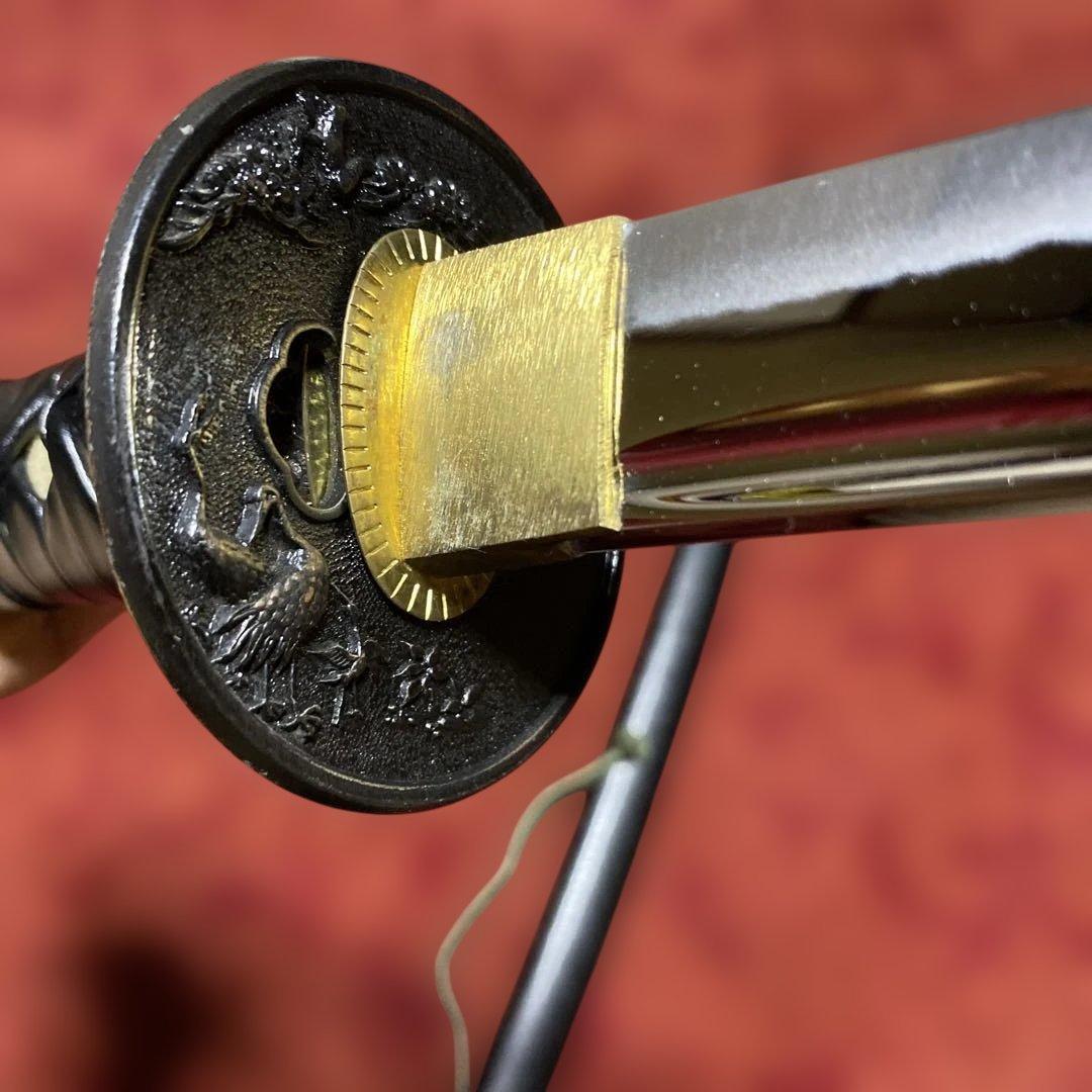 豪華居合刀 黒革巻柄 鶴松図楕円鍔 黒梨地鞘 - メルカリ