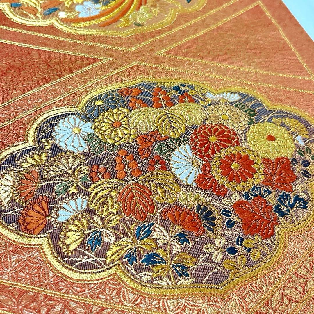 梅垣織物 袋帯 西陣織 七宝菱蒔絵文 正絹 金糸 オレンジゴールド系