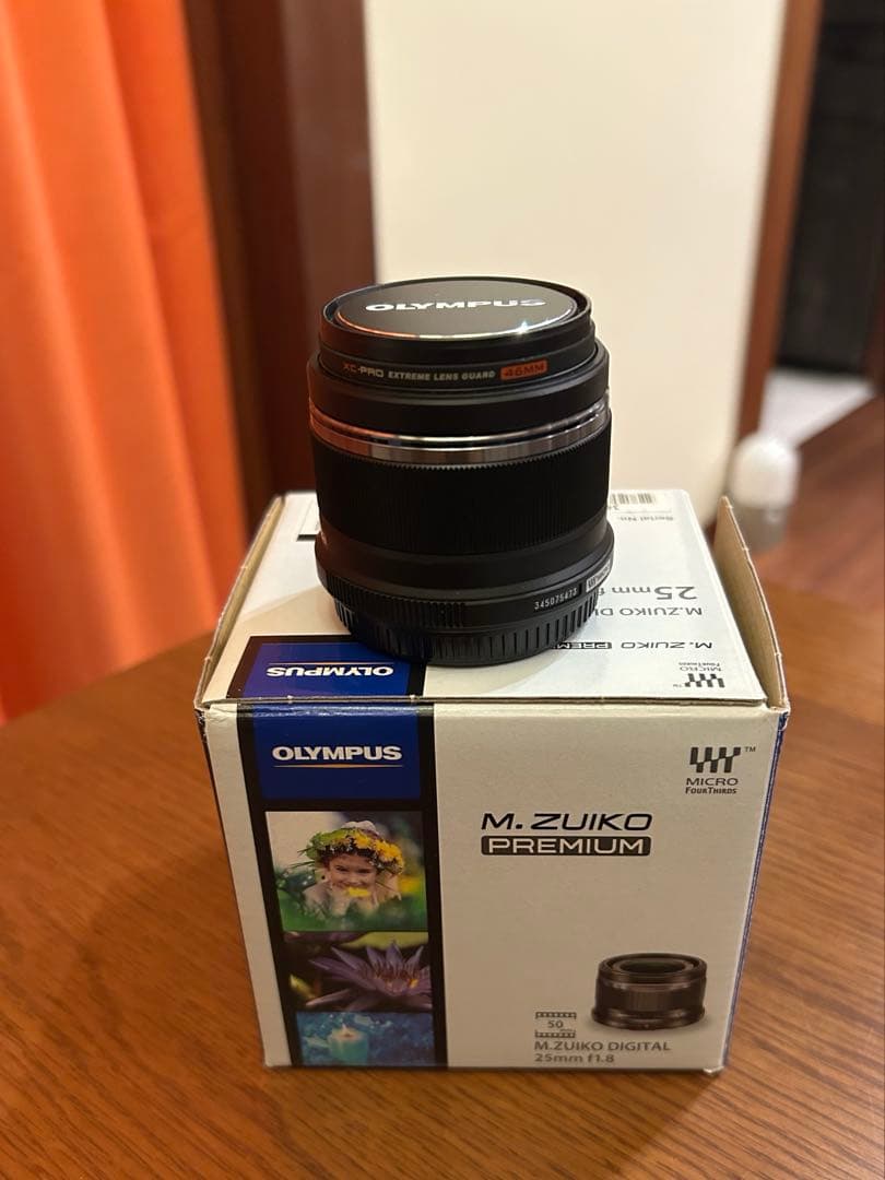 M.ZUIKO DIGITAL 25mm f1.8レンズ　ブラック Amazon.com : Olympus M.Zuiko Digital 25mm F1.8 Black for Micro