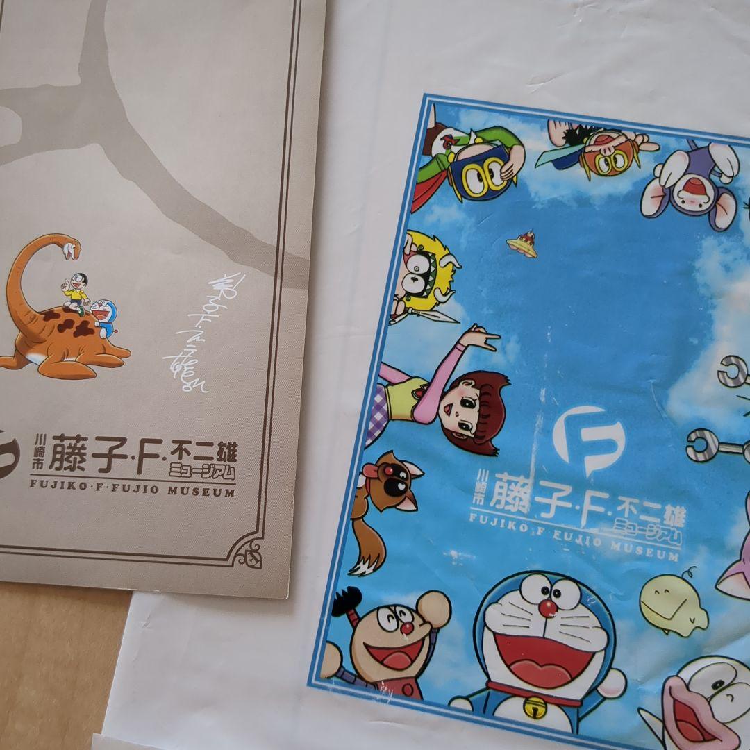 藤子不二雄ミュージアム 1周年ピンバッジ タオル他激レア - メルカリ