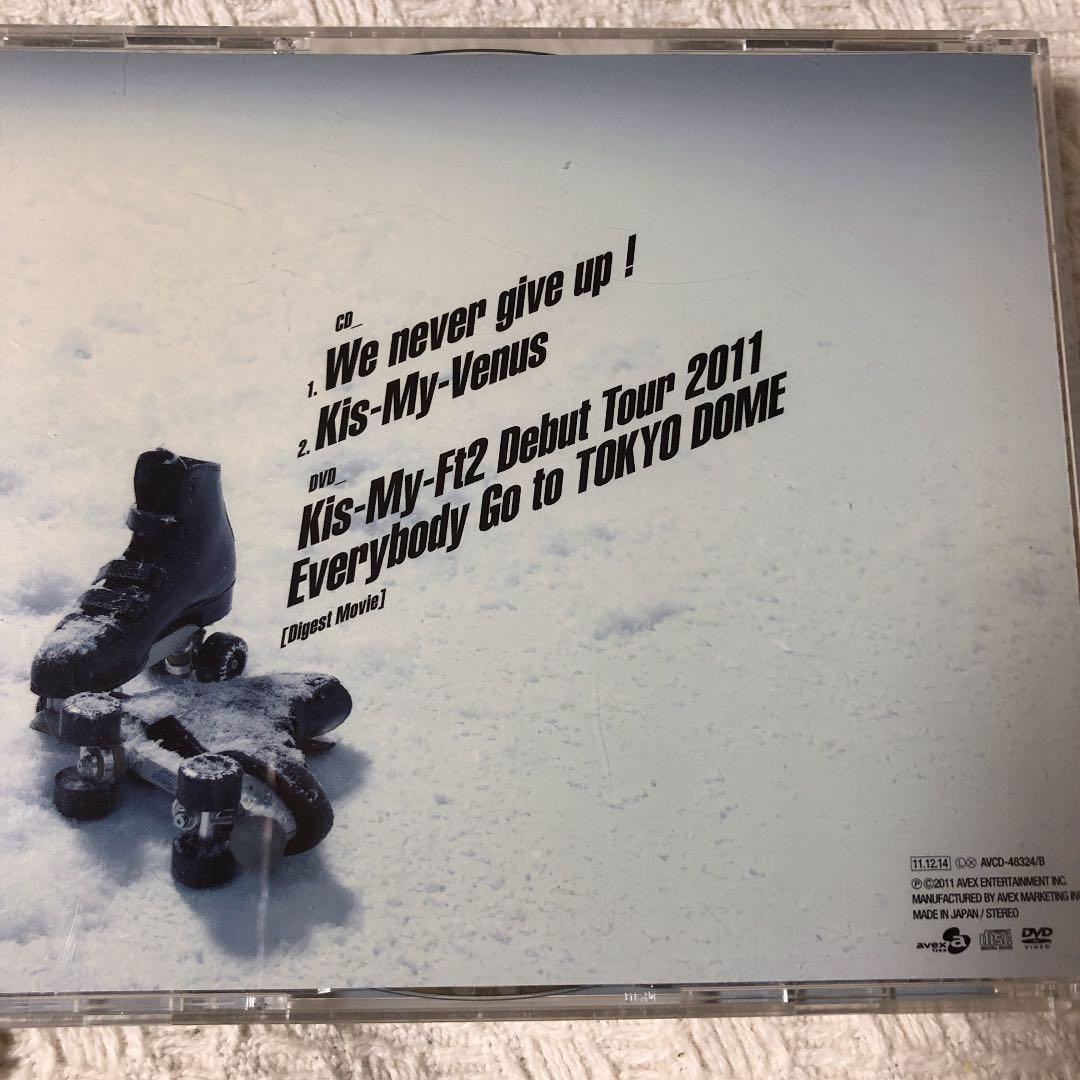 We never give up! - メルカリ