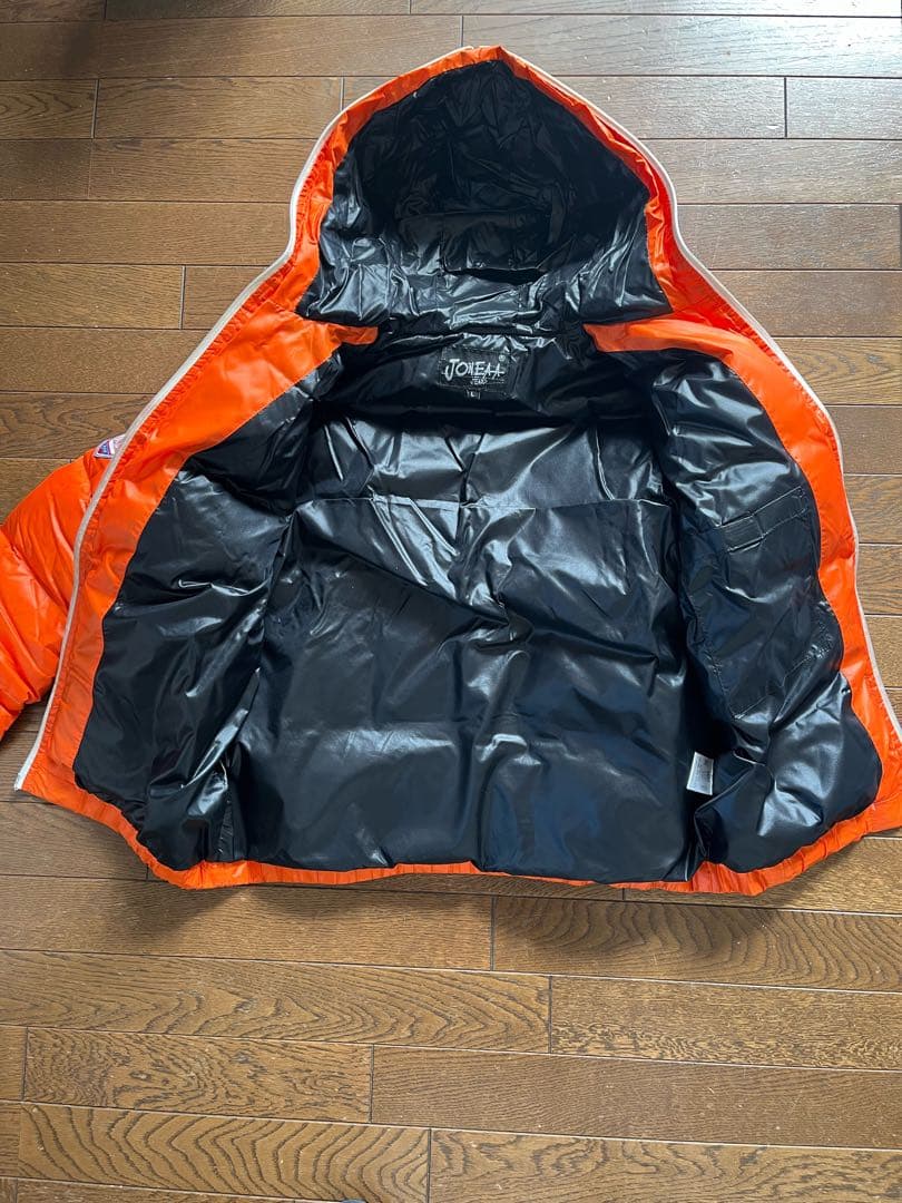 オレンジ フード付き ダウンジャケット - メルカリ