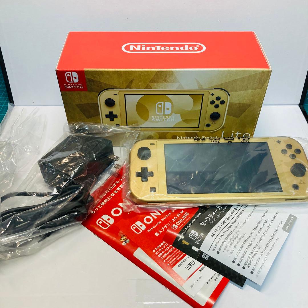 【極美品】ほぼ新品 Nintendo Switch Lite ゴールド ゼルダ ゼルダ」ファン必見、ハイラルの紋章を描いたゴールドボディの「Switch