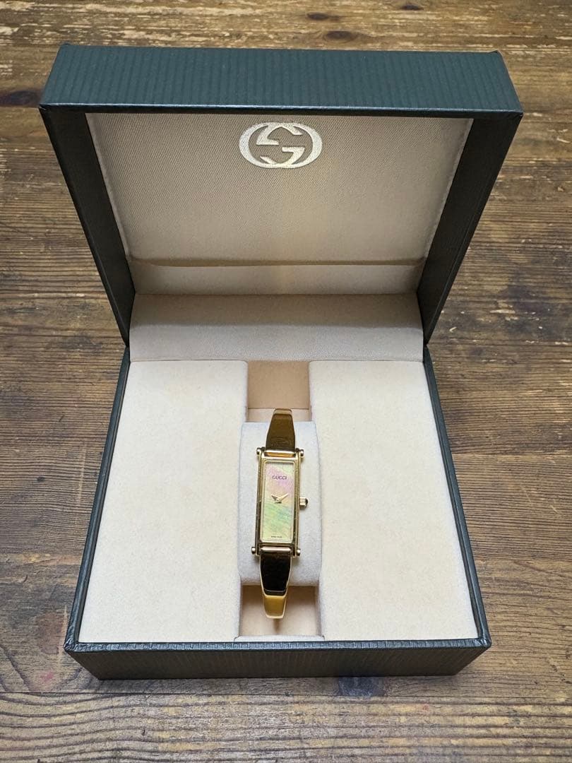 稼働新品電池 GUCCI 1500L シェル文字盤 ゴールド バングルウォッチ
