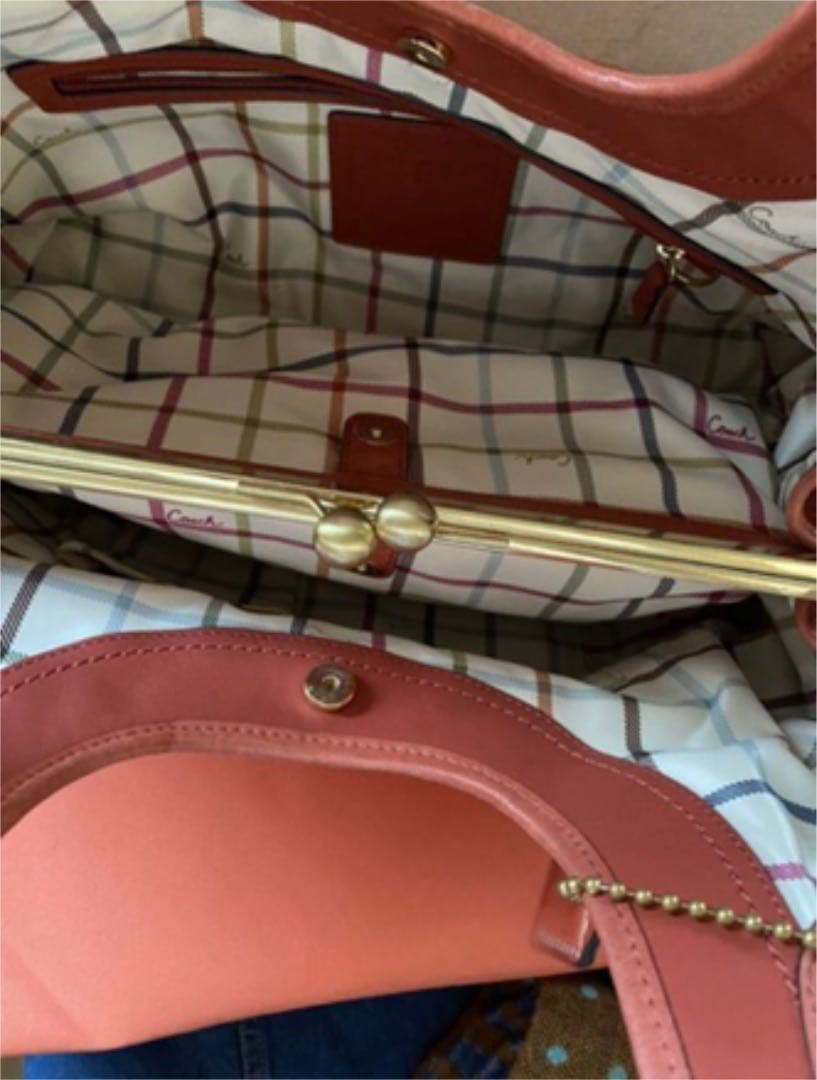 コーチ オレンジ エルゴレザープリーテッドフレームドサッチェルの通販