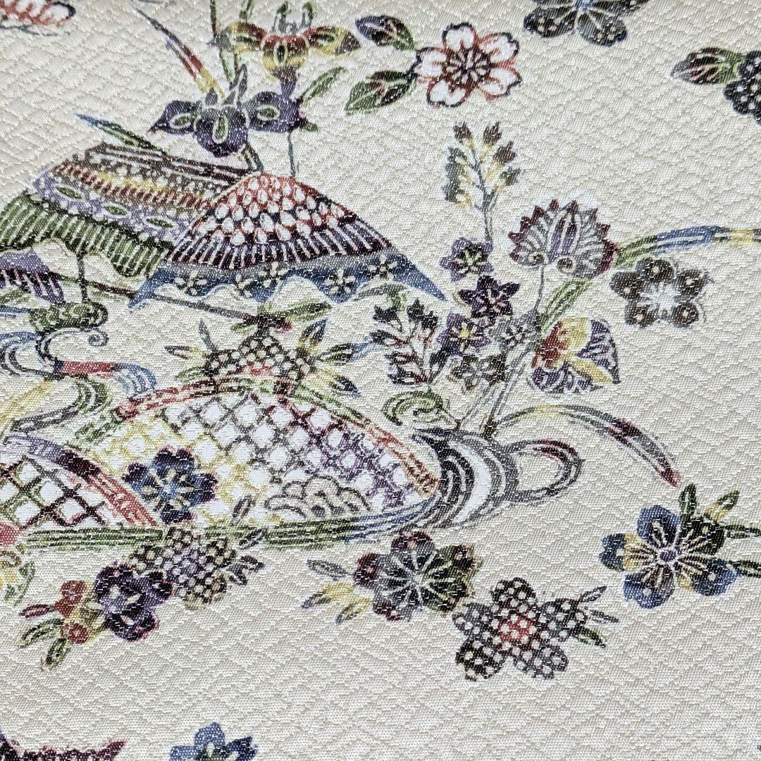 全通柄】正絹袋帯 白地に蝶・花文様の紅型調 両面使用可 淡紫〜生成り