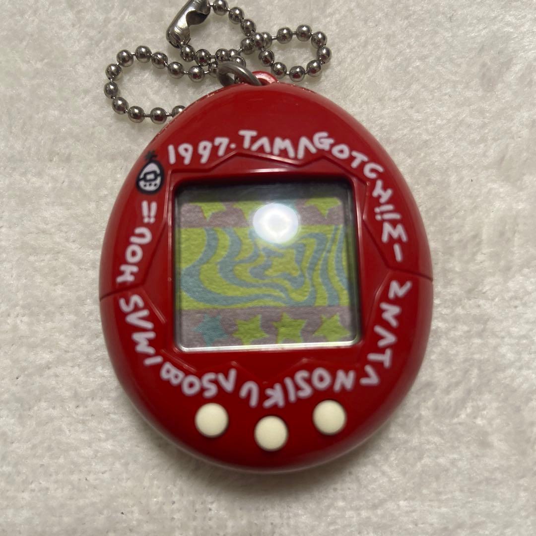 バンダイ 1996 初代たまごっち 赤色 ケースと説明書付 - メルカリ