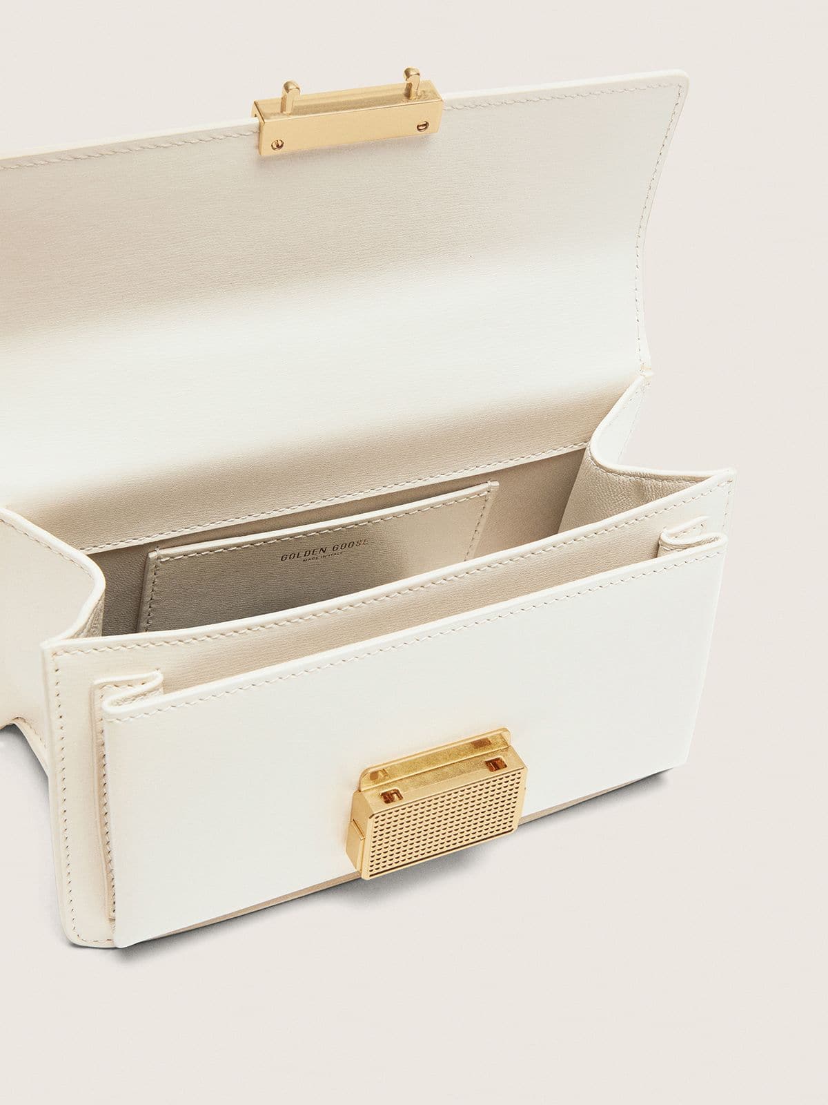Small Venezia Bag in butter-colored boarded leather with gold details